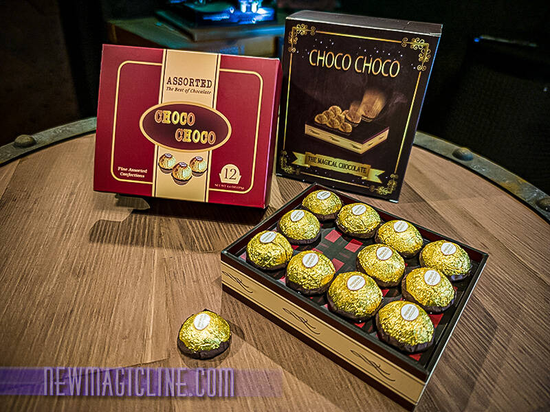 Choco Choco by Tora Magic - Pralinen erscheinen sichtbar in offerner Verpackung